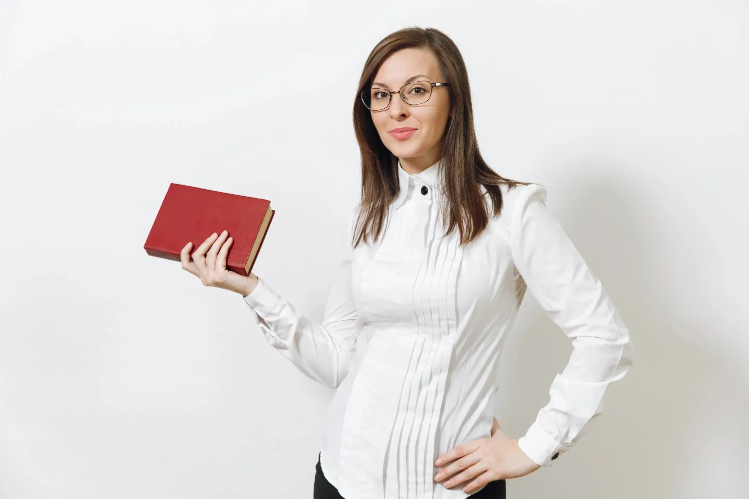 beautiful-happy-caucasian-young-smiling-brown-hair-business-woman-white-shirt-black-skirt-glasses-with-red-book-isolated-white-wall