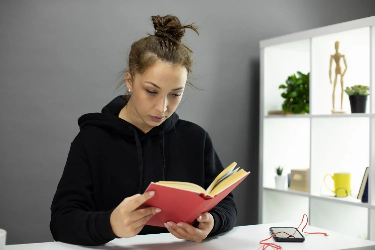 beautiful-student-sitting-home-reads-educational-literature-self-isolation canadianghostwriters
