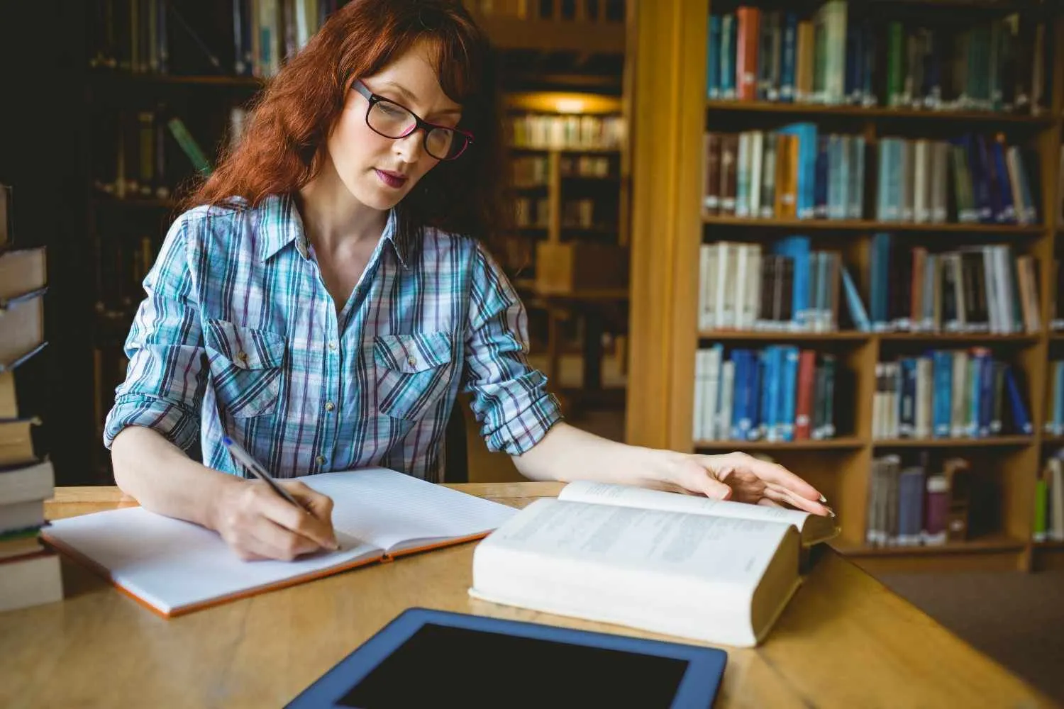 mature-student-studying-library canadianghostwriters