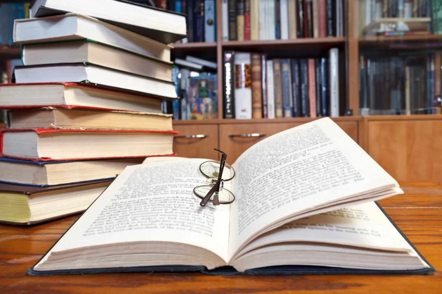 open-books-wooden-table canadianghostwriters