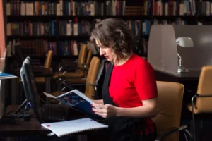 professional-woman-educator-manager-working-public-library-high-school-college canadianghostwriters