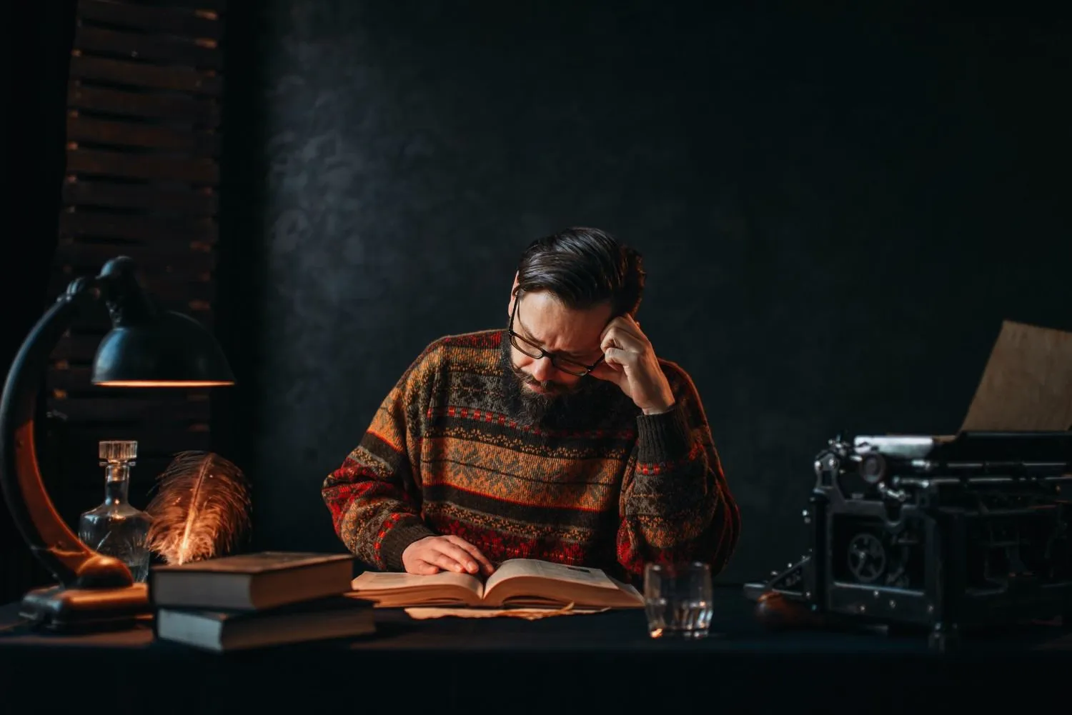 bearded-author-glasses-reading-book-canadianghostwriters